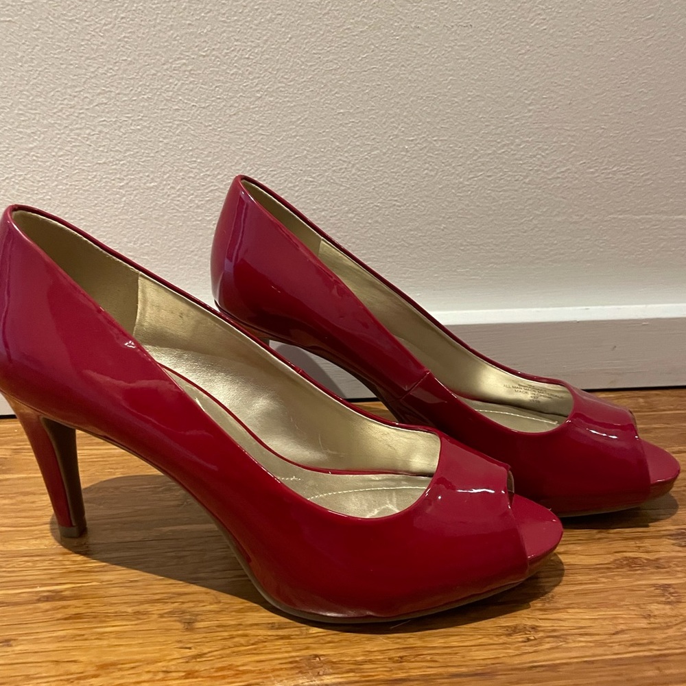 Red patent peep toe heels